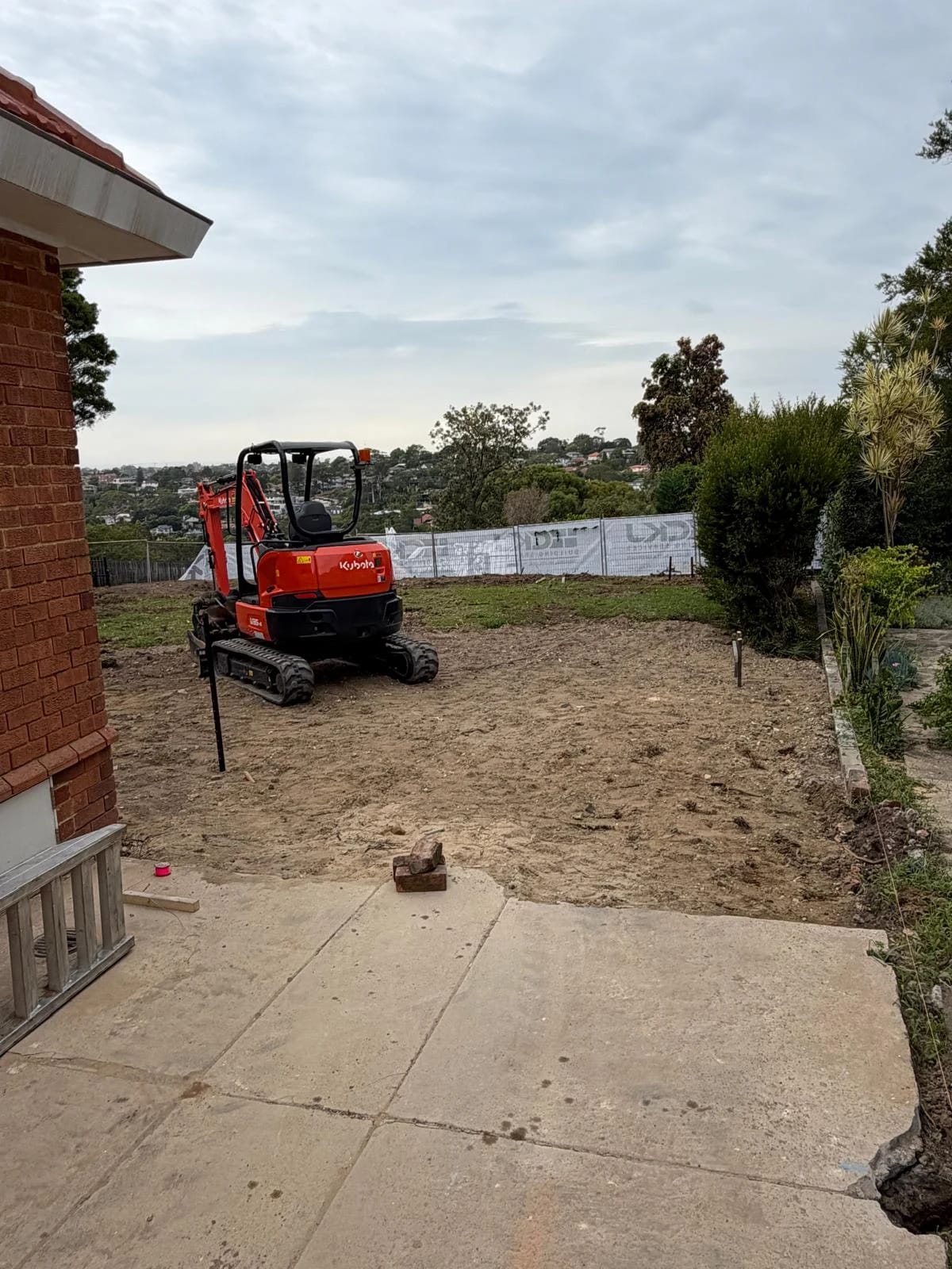 Garage structure being demolished and cleared