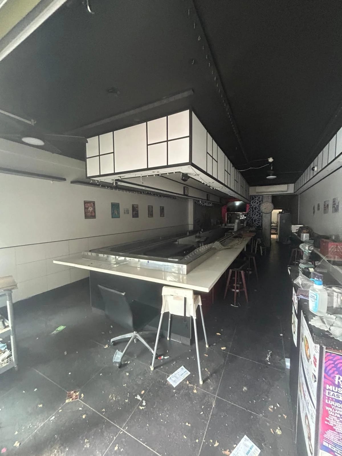 Long sushi train tenancy with the central service counter before removal