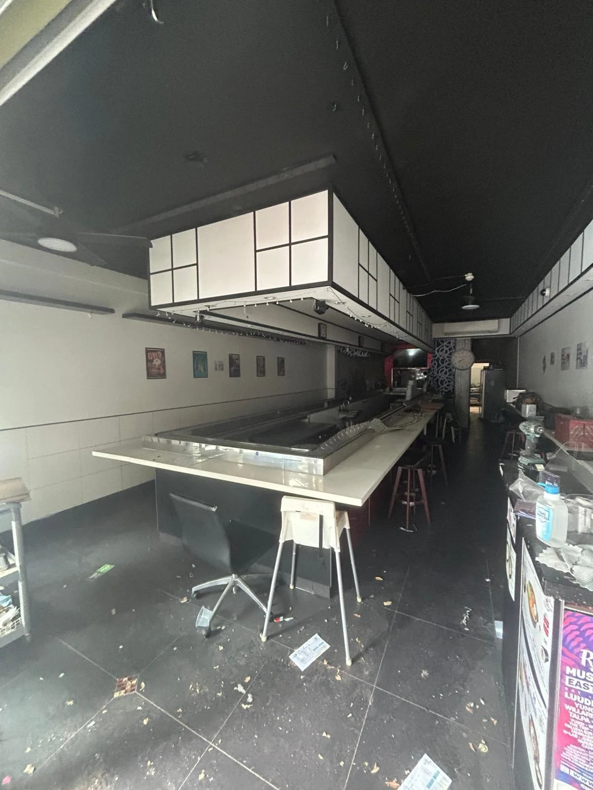 Long sushi train tenancy with the central service counter before removal