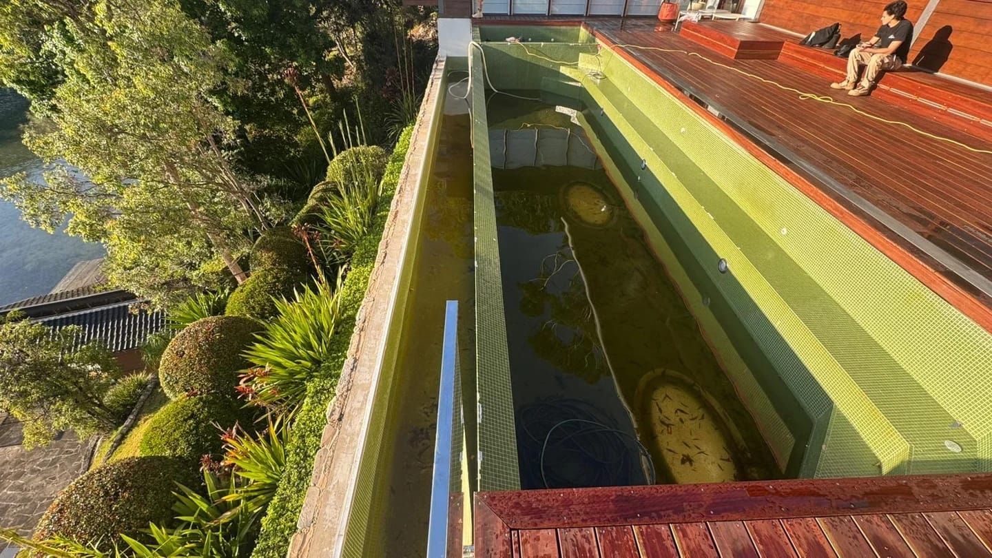 Full length of the mosaic-lined lap pool before surface removal