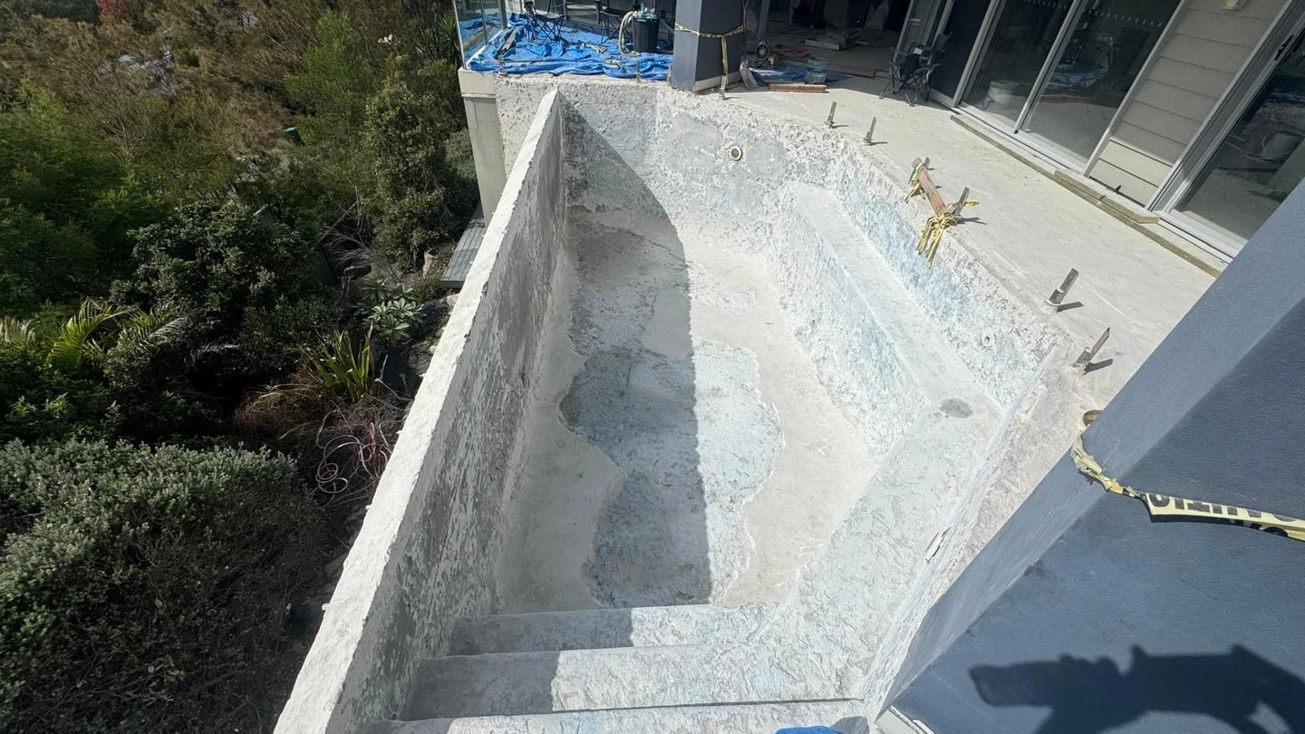 Elevated residential pool shell stripped for the next contractor